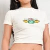 Friends Central Perk Logo Baby Tee 2 Friends Central Perk Logo Baby Tee -Thread Heads Sale Store Natural Baby Tees Front 405a570f 1def 406c 8cc5 d1e48c5886bd