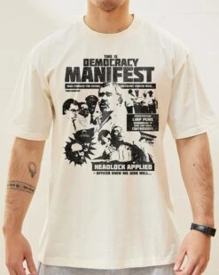 Democracy Manifest: Tabloid Edition T-Shirt -Thread Heads Sale Store Natural Front 1e9bd20d dad0 4762 bda3 bd2e2f343c2b
